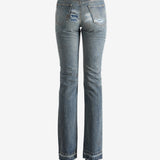 Blue pants worn by a person, showing the pants fit