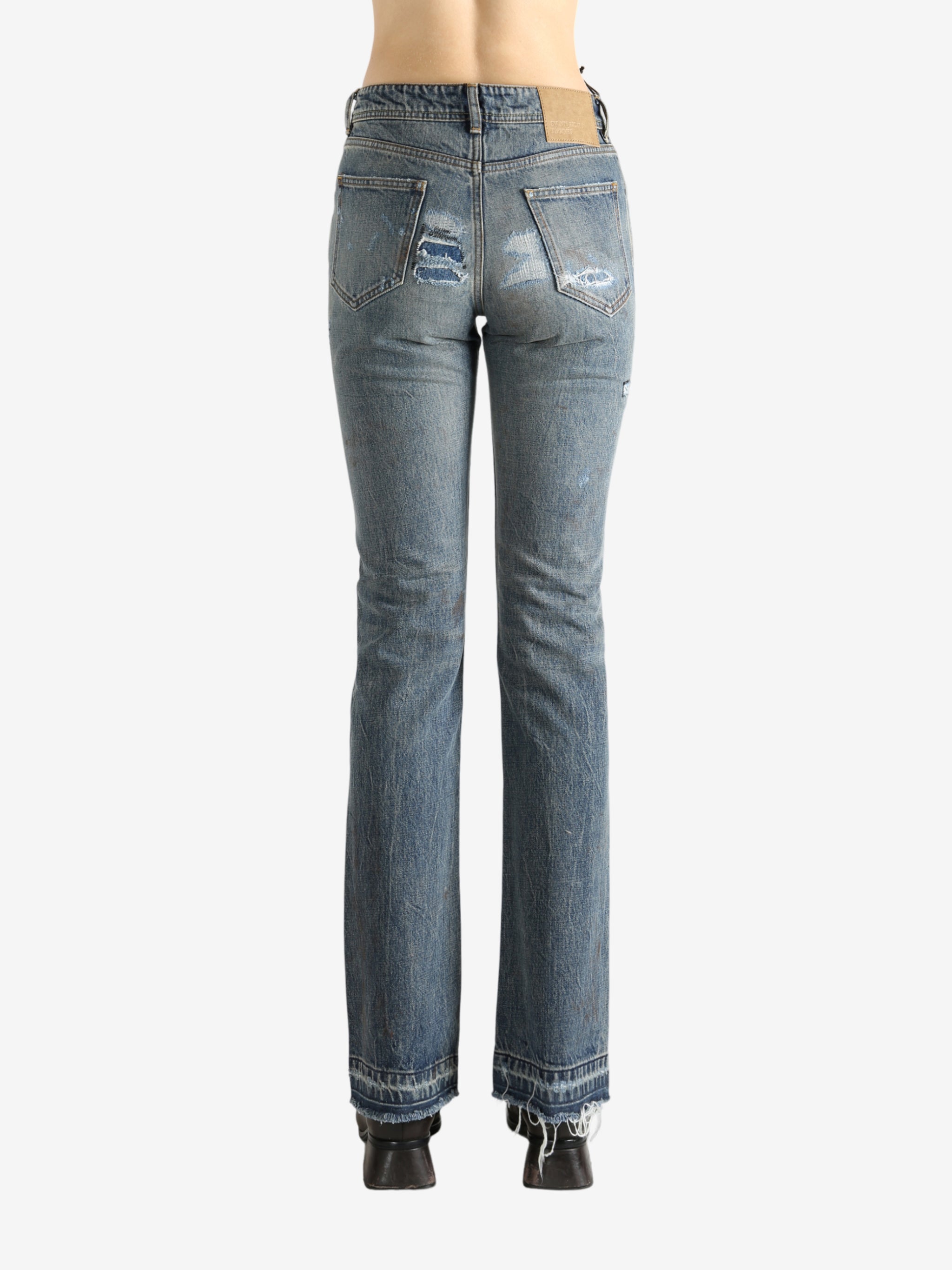 Blue pants worn by a person, showing the pants fit