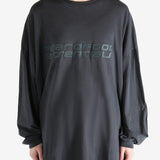 Black shirt worn by a person, showing the shirt's fit