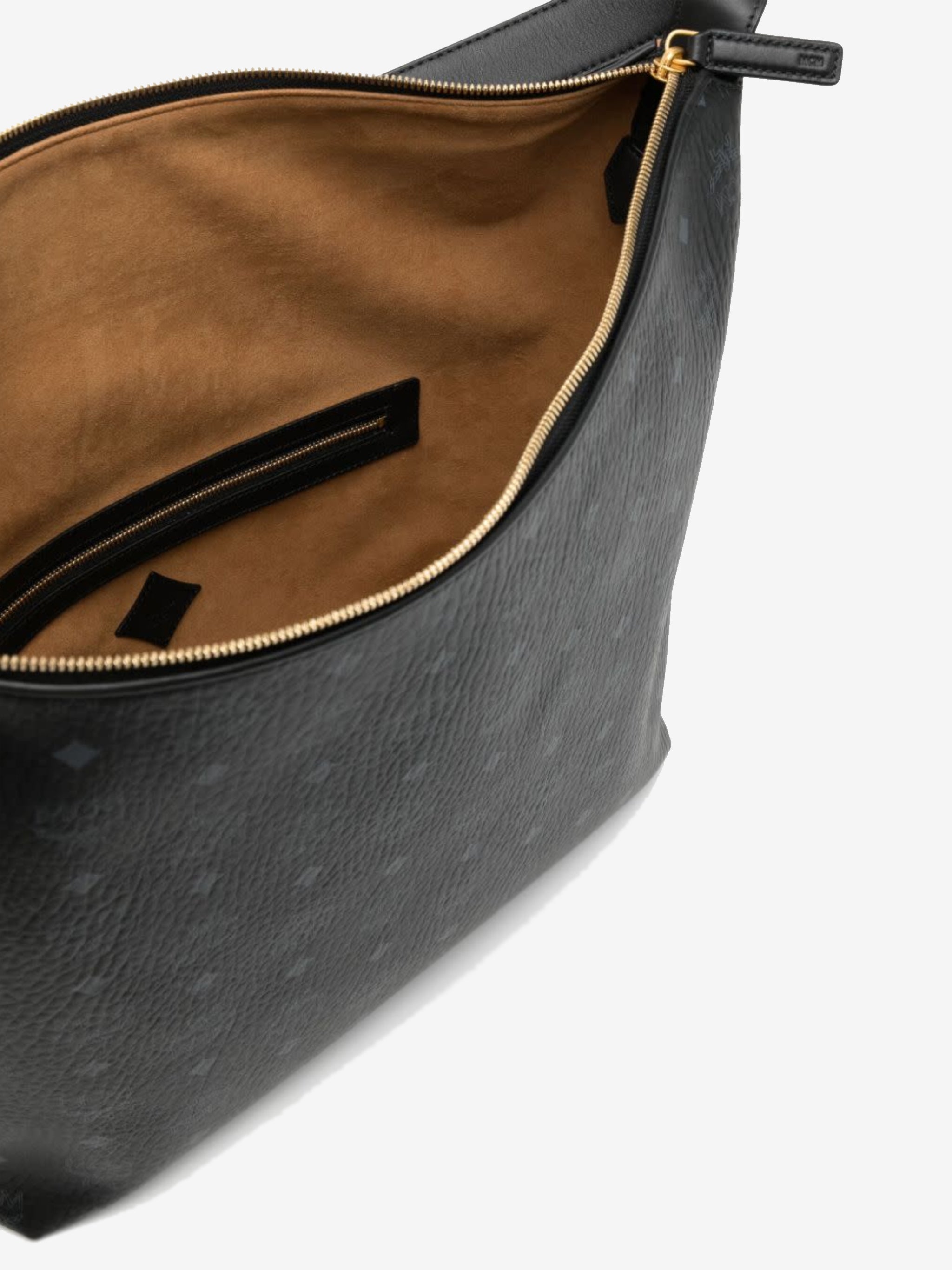Close up of black bag, showing texture of the leather fabric