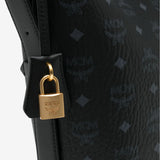 Close up of black bag, showing texture of the leather fabric