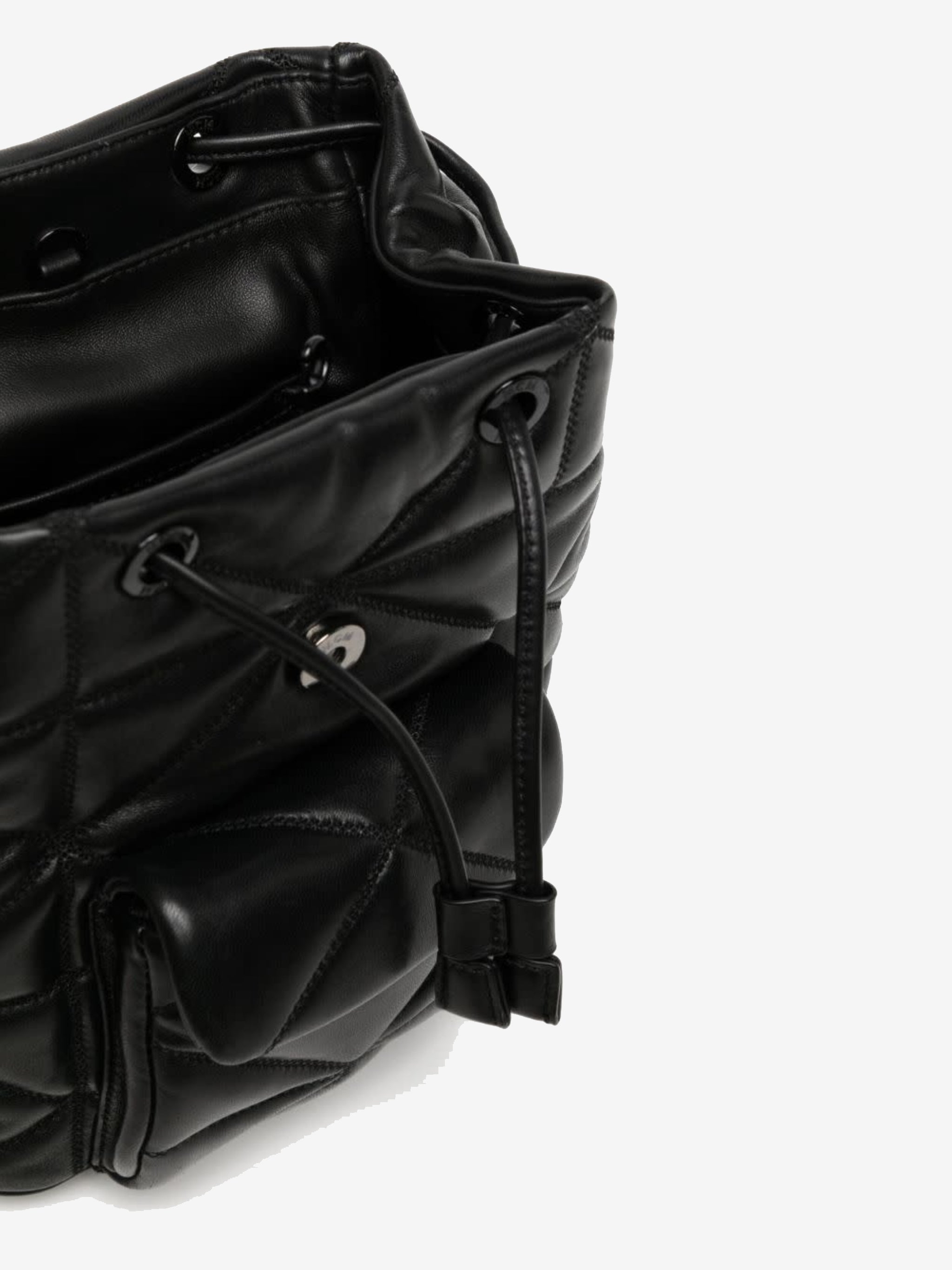 Close up of black bag, showing texture of the leather fabric