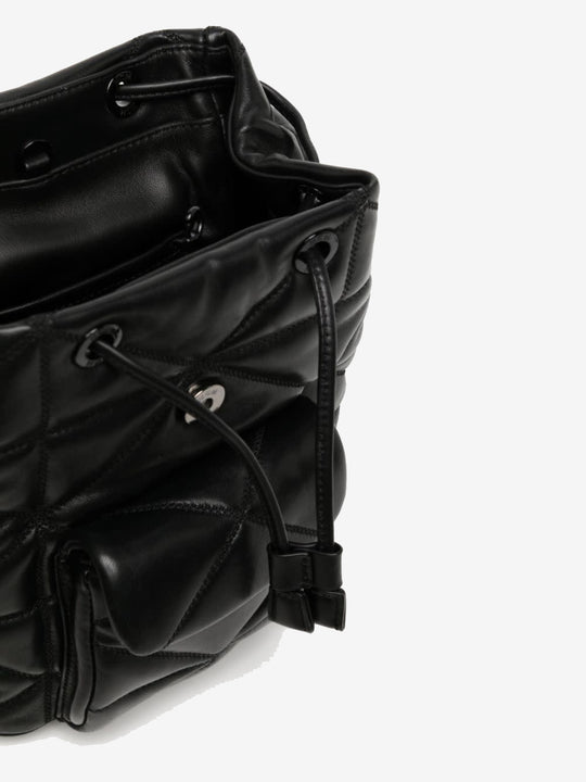 Close up of black bag, showing texture of the leather fabric