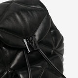 Close up of black bag, showing texture of the leather fabric