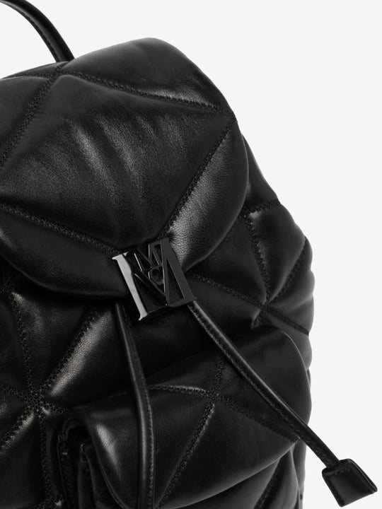Close up of black bag, showing texture of the leather fabric