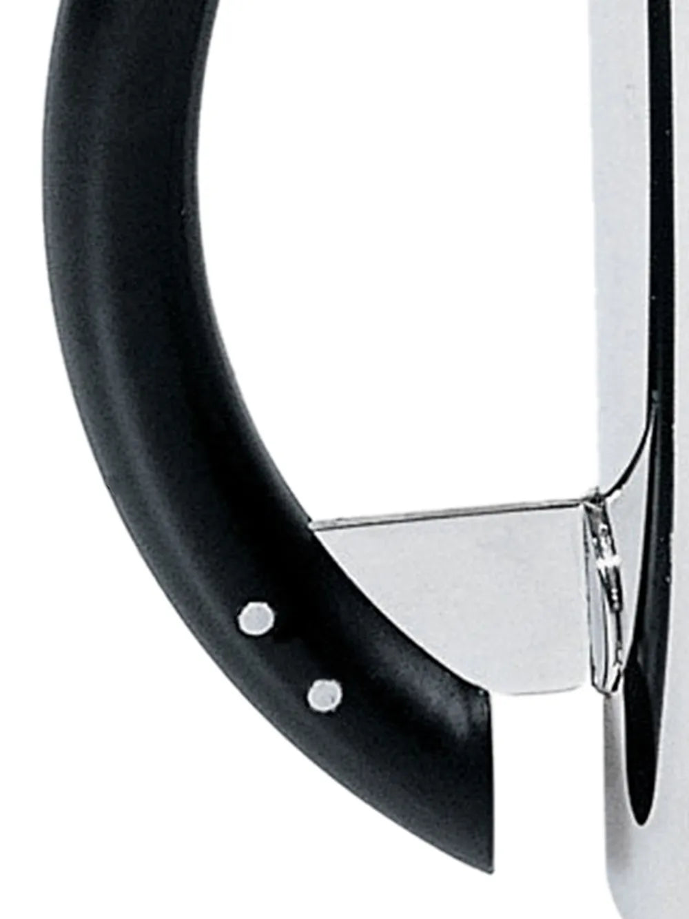 Close up of black pitcher, showing texture of the steel fabric