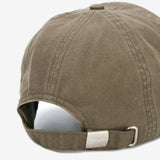 Close up of tan hats, showing texture of the cotton fabric
