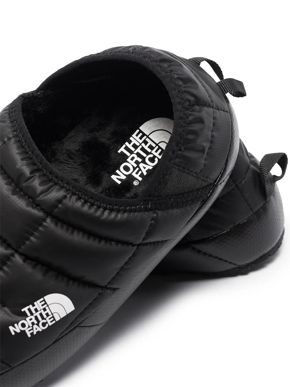 Close up of black shoes, showing texture of the fabric