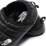 Close up of black shoes, showing texture of the fabric