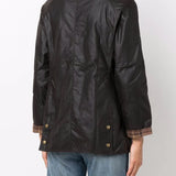 Brown jacket worn by a person, showing the jacket's fit