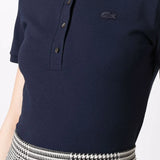 Navy shirt worn by a person, showing the shirt's fit