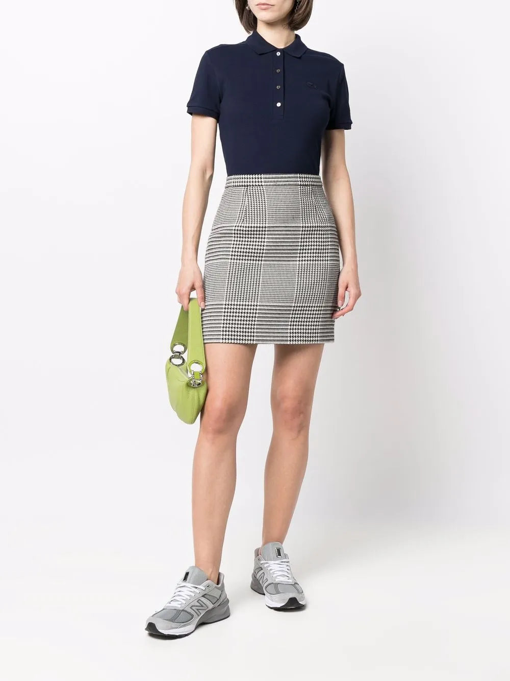 Navy shirt worn by a person, showing the shirt's fit