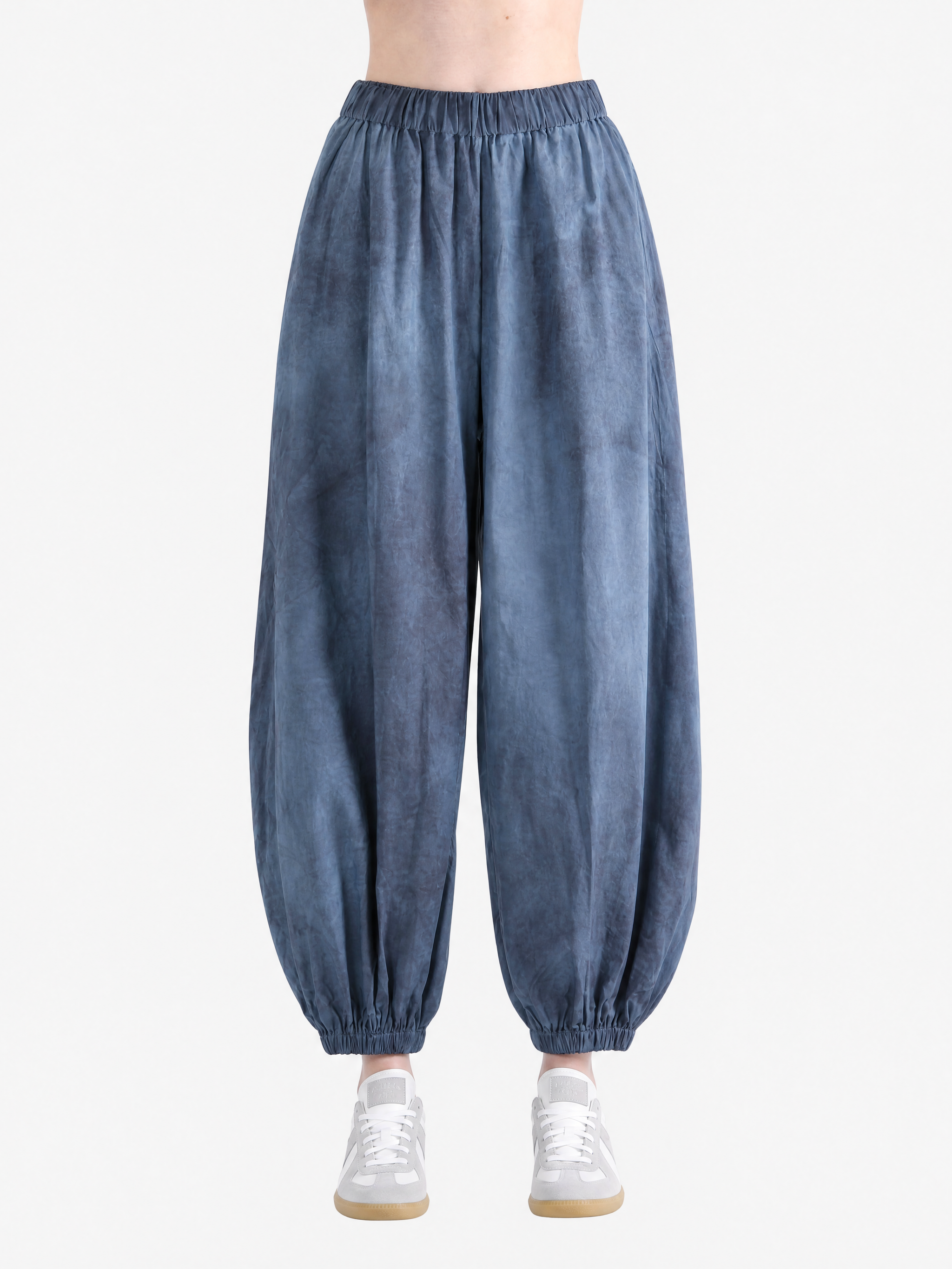 Blue pant worn by a person, showing the pant fit