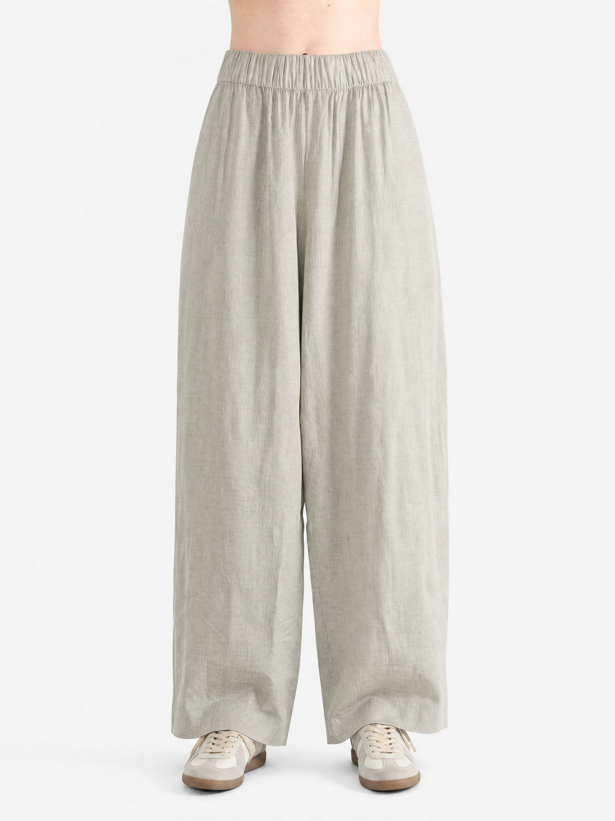 Grey pant worn by a person, showing the pant fit