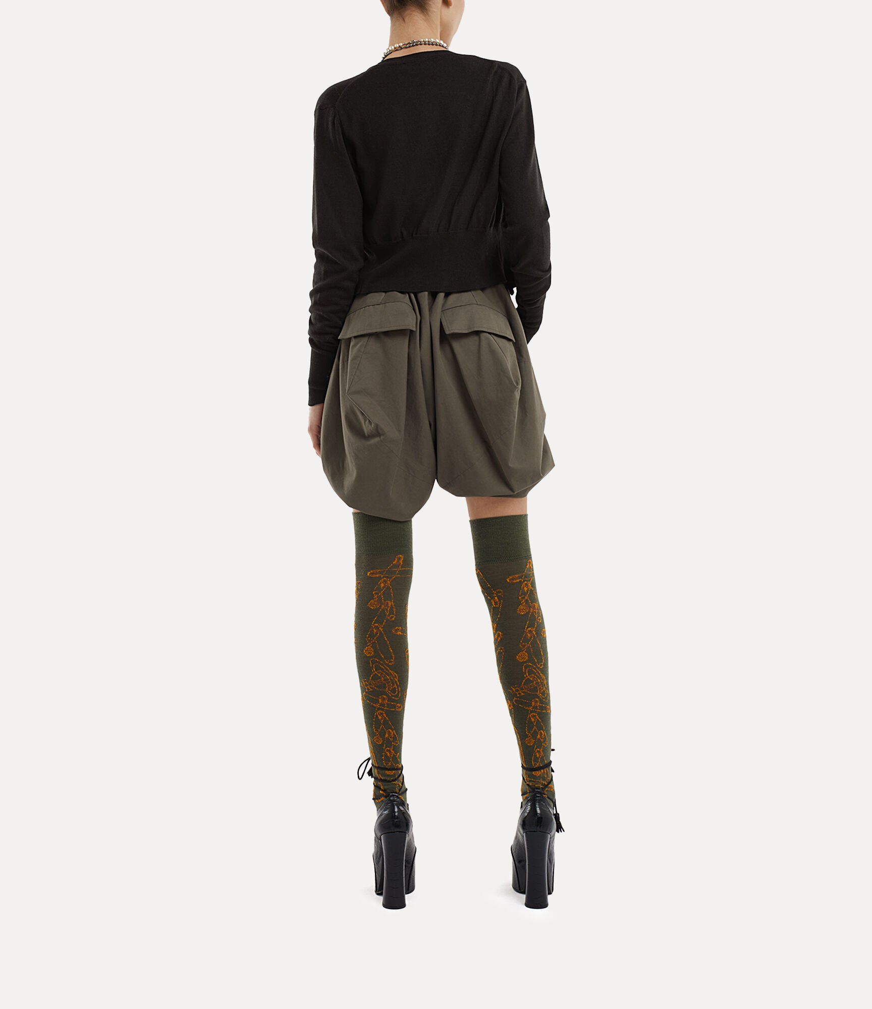 black top worn by a person, showing the top fit