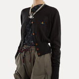 black top worn by a person, showing the top fit