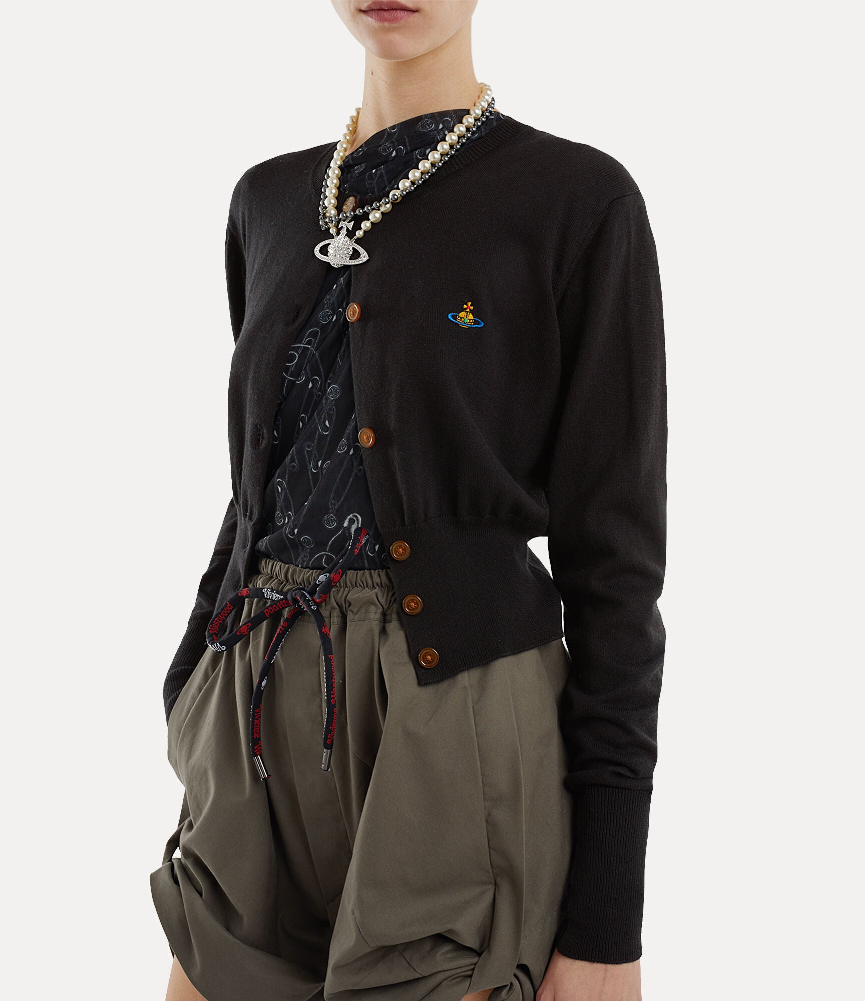 black top worn by a person, showing the top fit
