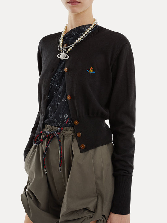 black top worn by a person, showing the top fit