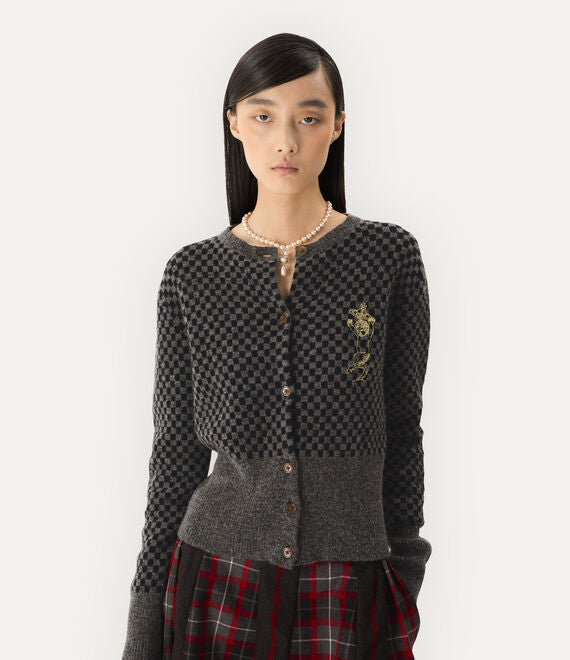 Grey top worn by a person, showing the top fit