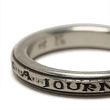 Close up of silver ring,showing texture of the silver fabric.