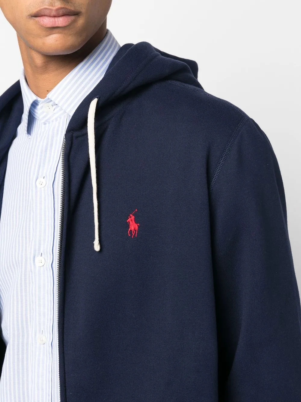 Close up of navy hoodie , showing texture of the fabric