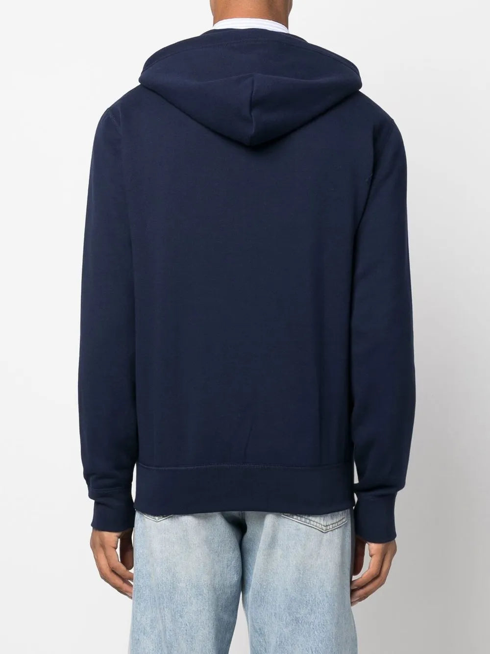 Navy hoodie worn by a person, showing the hoodie's fit