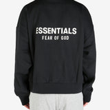 black hoodies worn by a person, showing the hoodies's fit
