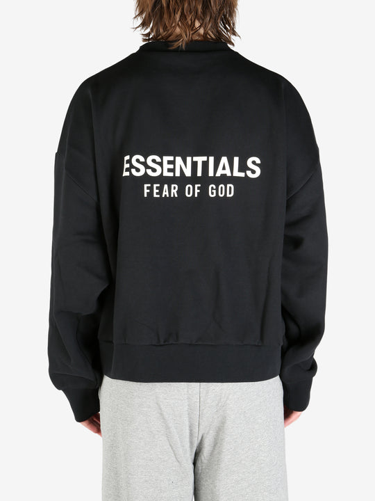 black hoodies worn by a person, showing the hoodies's fit
