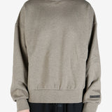 tan hoodies worn by a person, showing the hoodies fit
