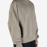 tan hoodies worn by a person, showing the hoodies fit