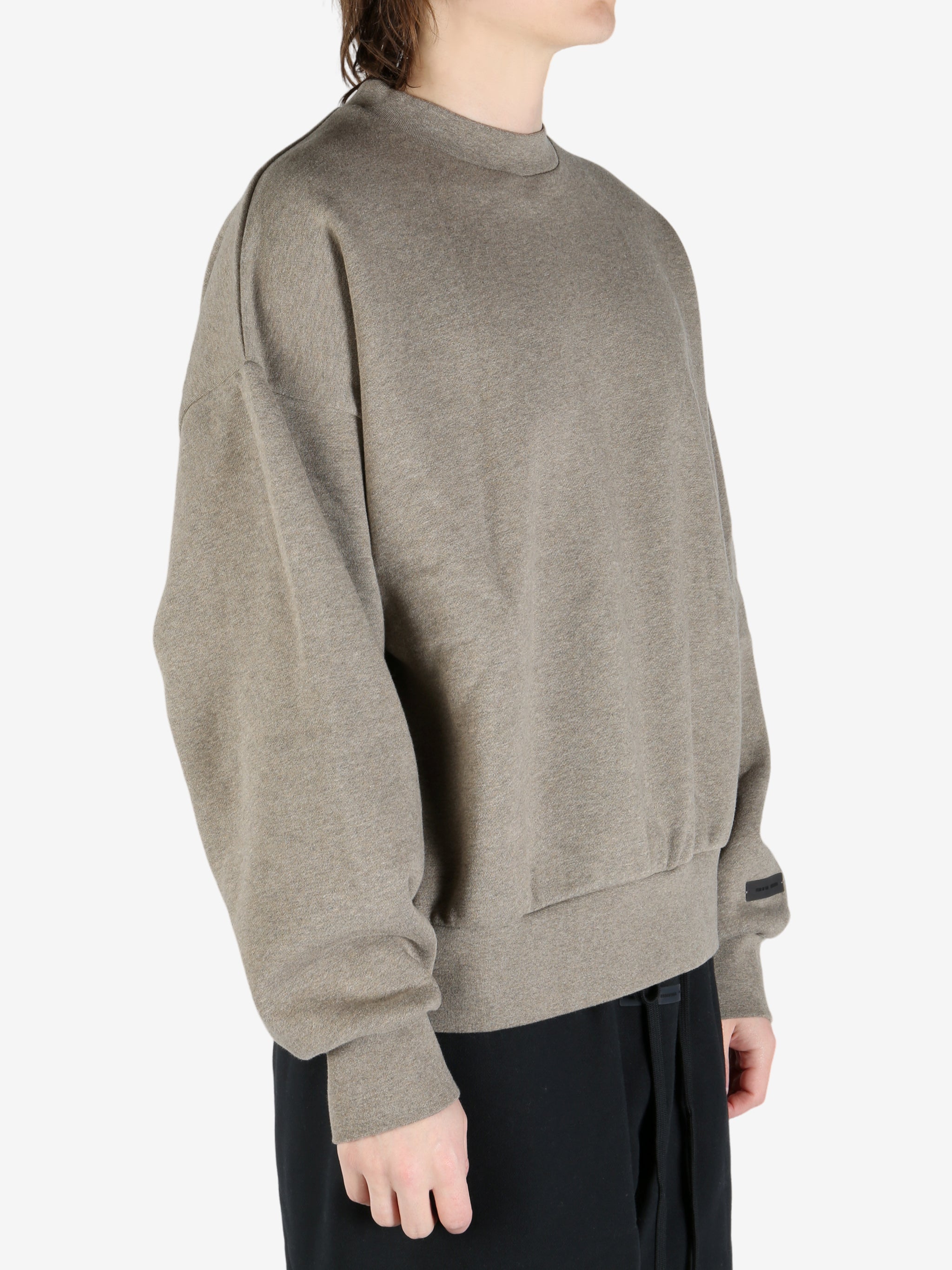 tan hoodies worn by a person, showing the hoodies fit