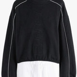 Black hoodie worn by a person, showing the hoodie's fit
