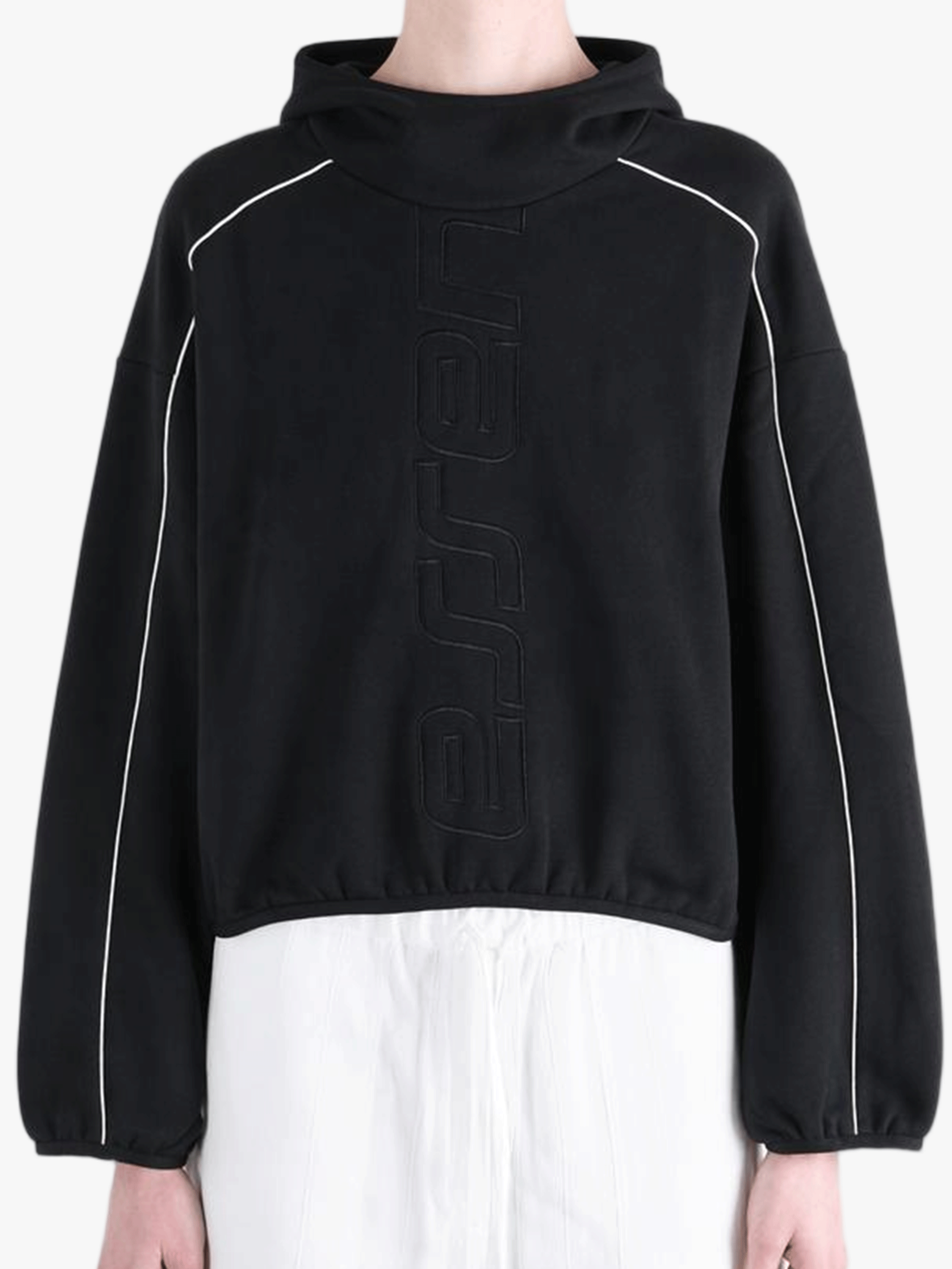 Black hoodie worn by a person, showing the hoodie's fit