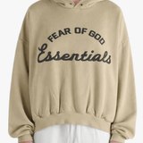Tan hoodies worn by a person, showing the hoodies fit
