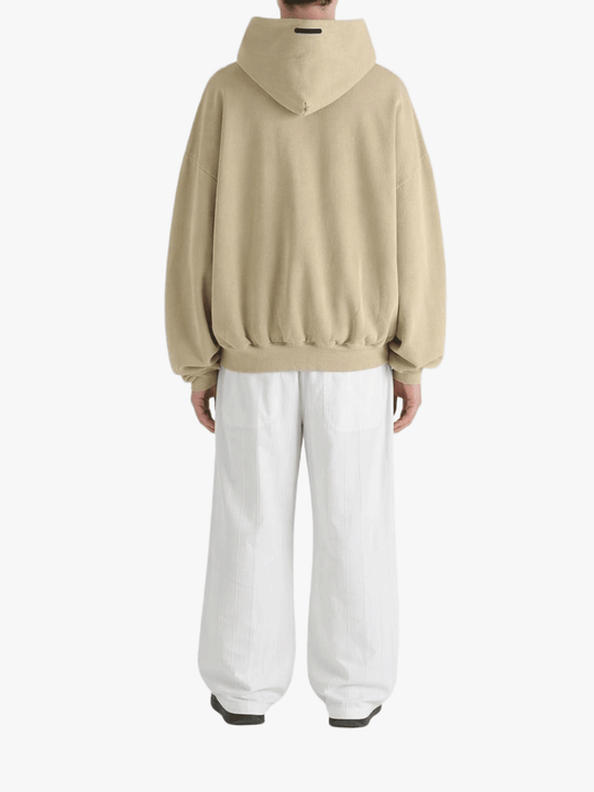 Tan hoodies worn by a person, showing the hoodies fit
