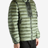 Green jacket worn by a person, showing the jacket's fit