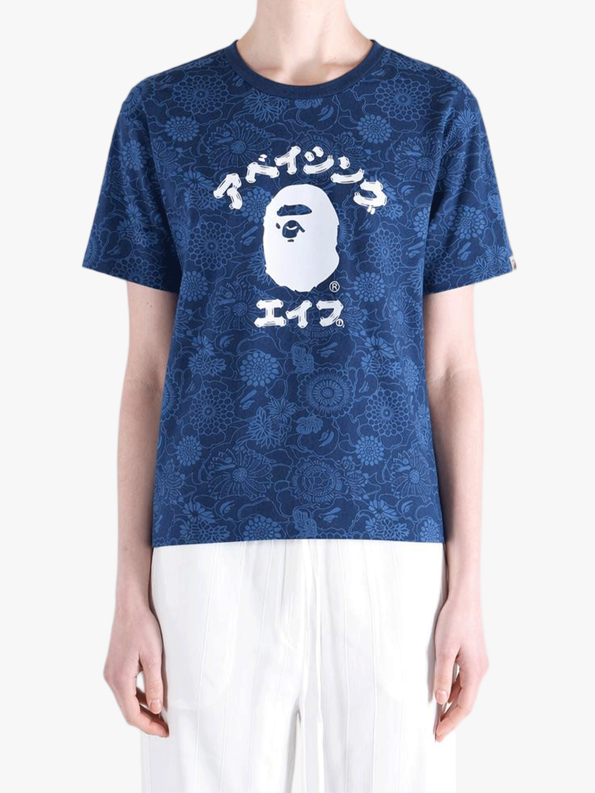 Blue t-shirt worn by a person, showing the shirt's fit