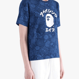 Blue t-shirt worn by a person, showing the shirt's fit