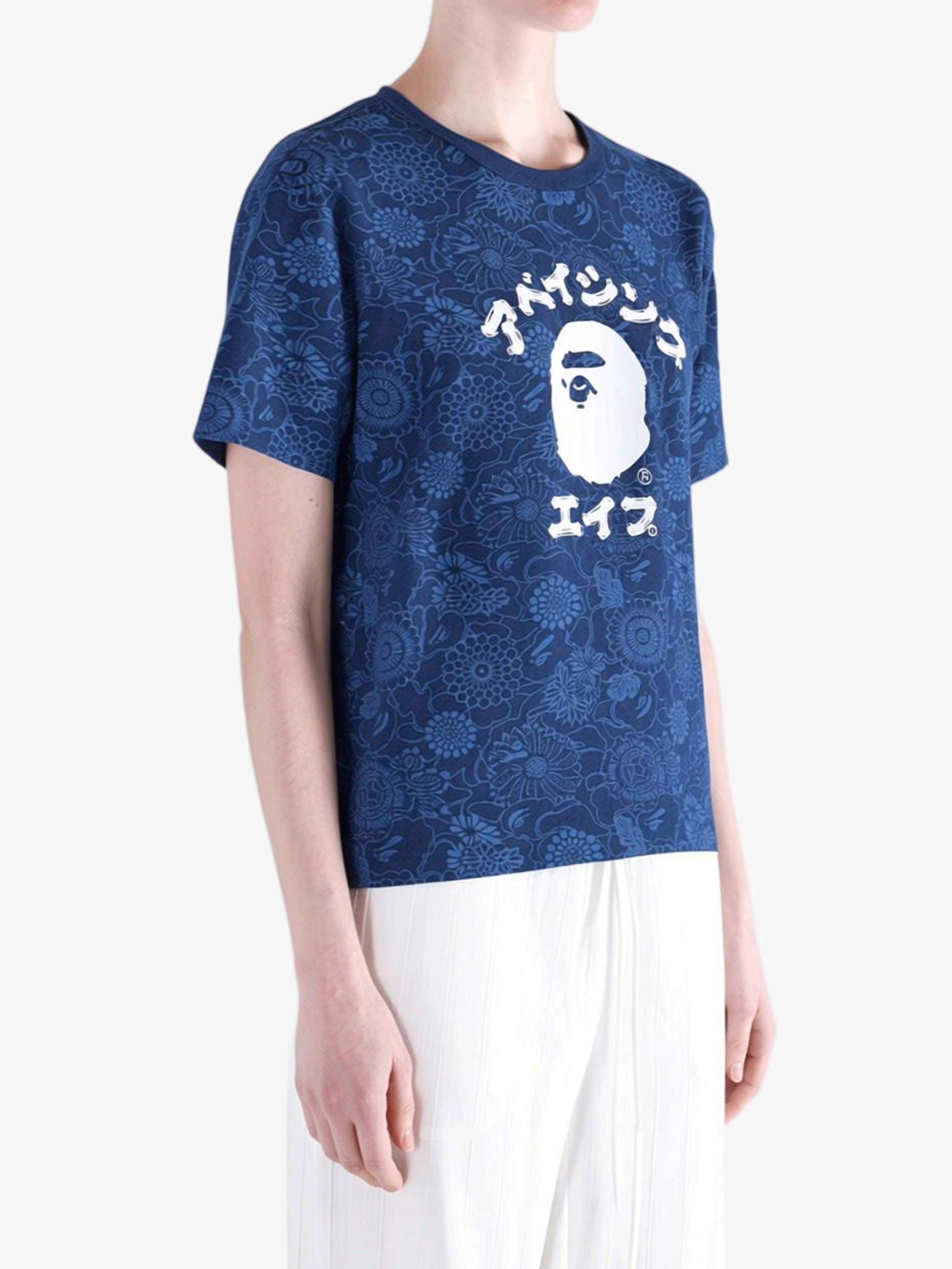Blue t-shirt worn by a person, showing the shirt's fit