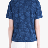 Blue t-shirt worn by a person, showing the shirt's fit