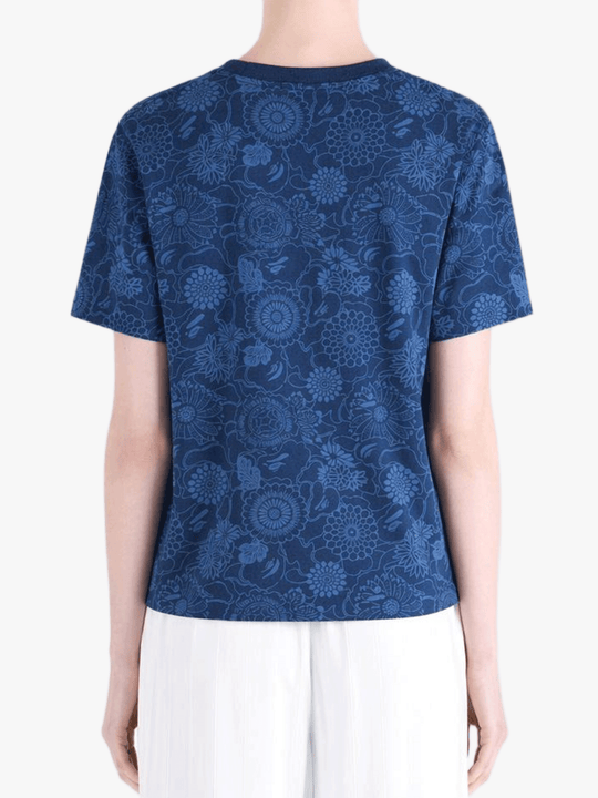 Blue t-shirt worn by a person, showing the shirt's fit
