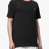 black t-shirt worn by a person, showing the t-shirt fit