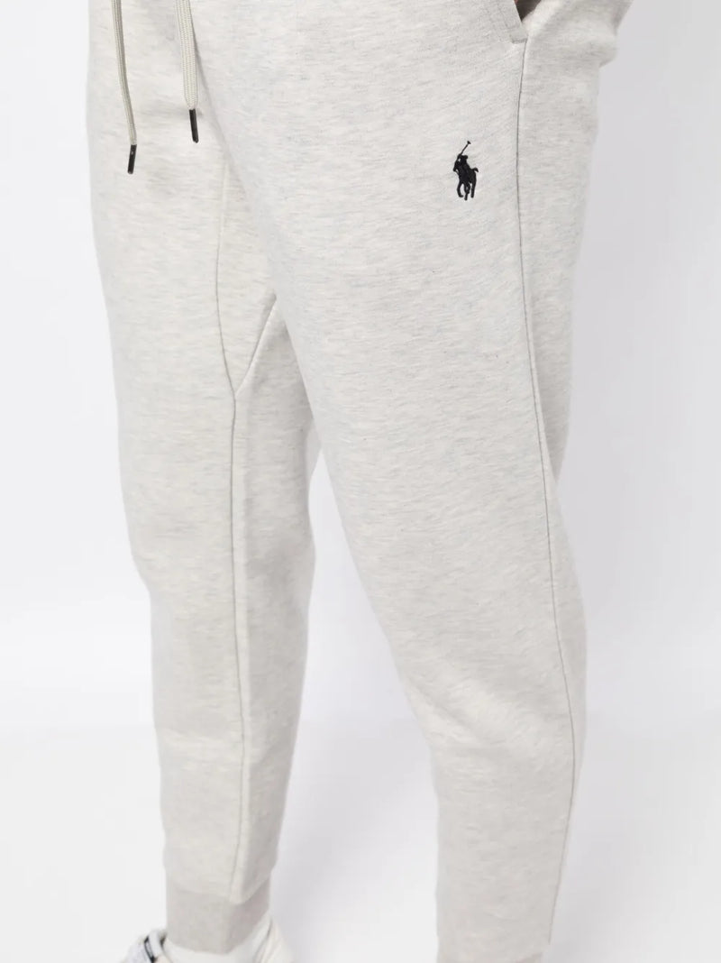 Close up of the grey pants, showing texture of the cotton and polyester fabric