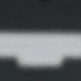 Close-up of black t-shirt, showing the detial of the logo