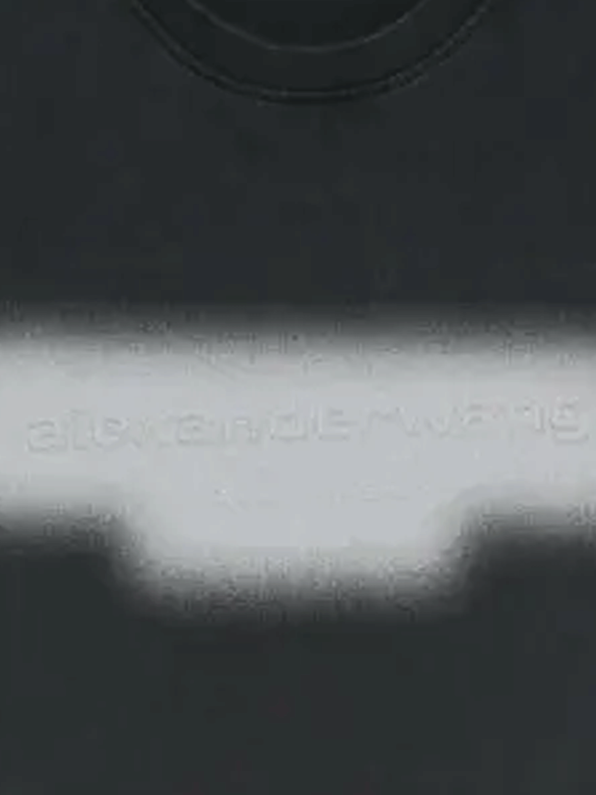 Close-up of black t-shirt, showing the detial of the logo
