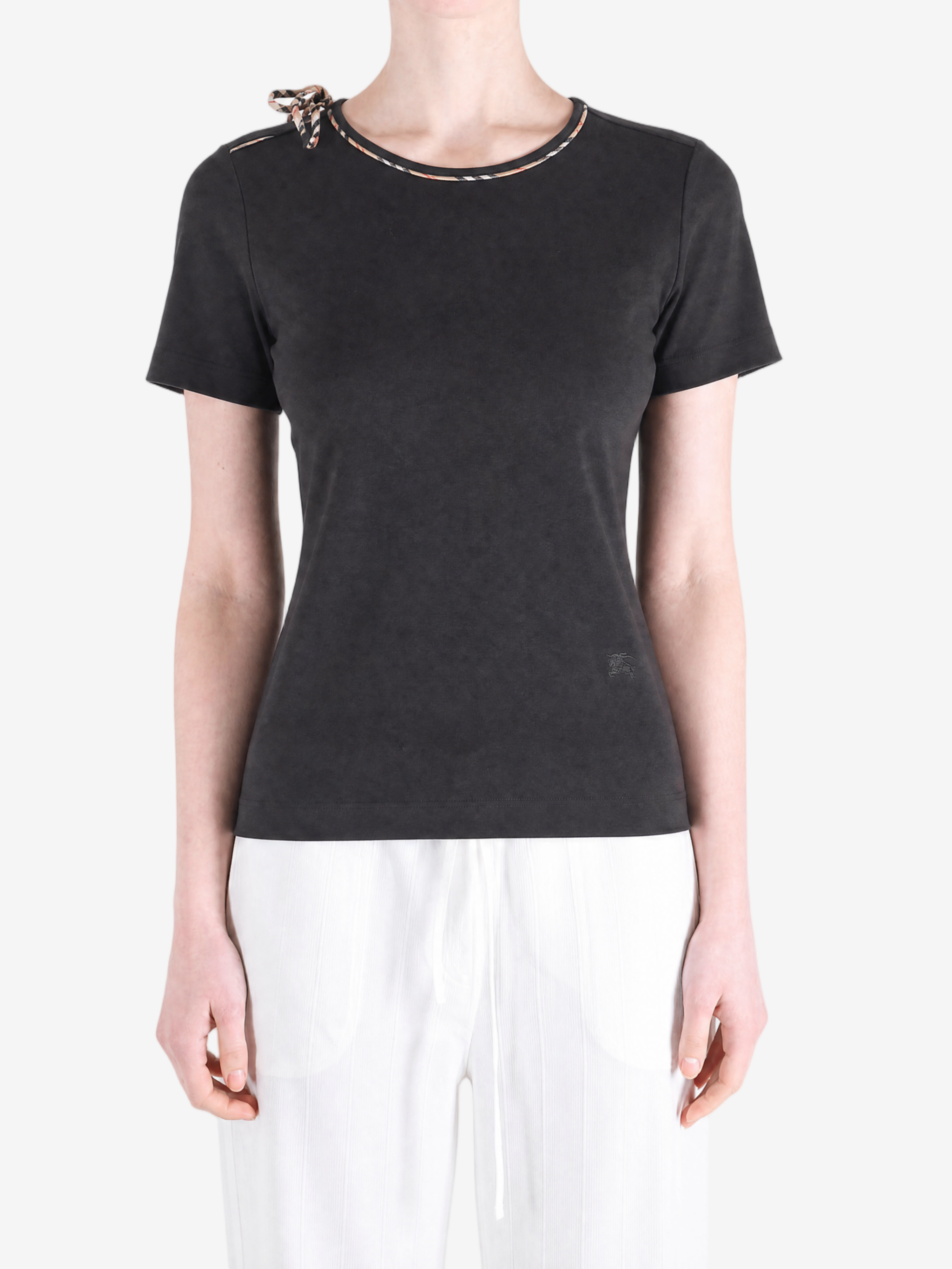  Black shirts worn by a person, showing the shirts fit