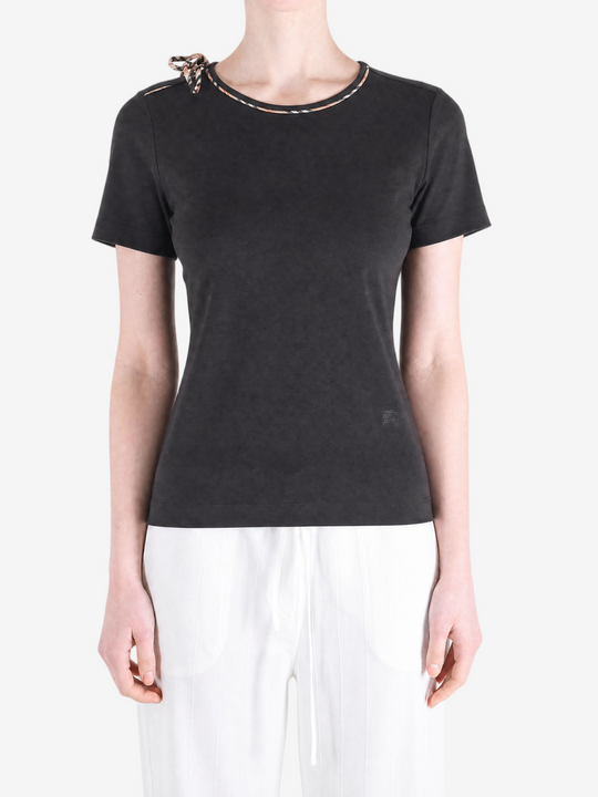  Black shirts worn by a person, showing the shirts fit