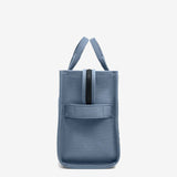 Blue tote bag, side view