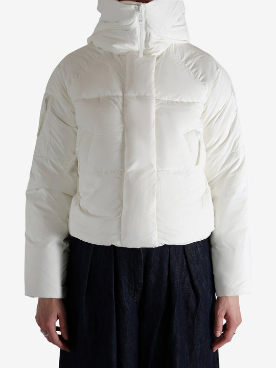 white down jacket，worn by a person, showing the down jacket fit