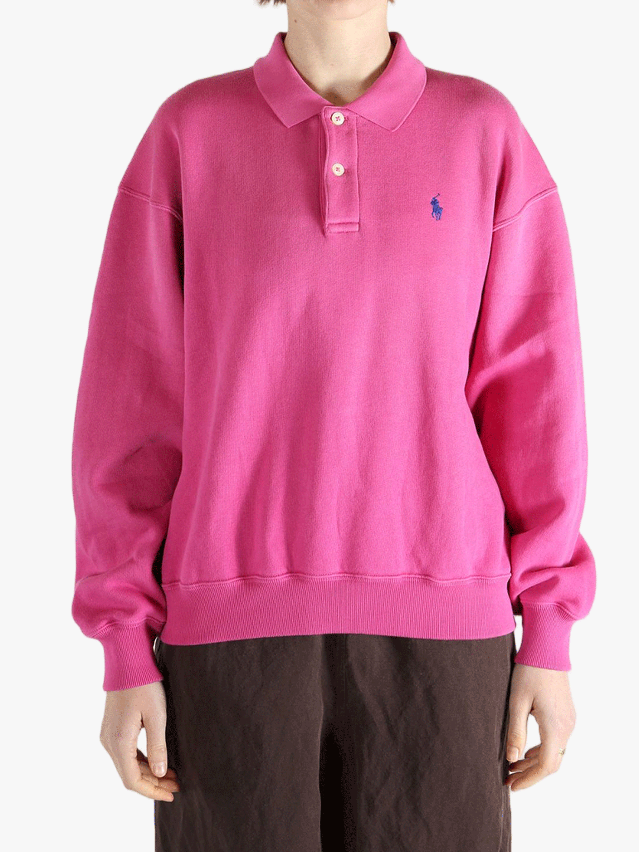 Pink sweatshirt worn by a person, showing the sweatshirt's fit